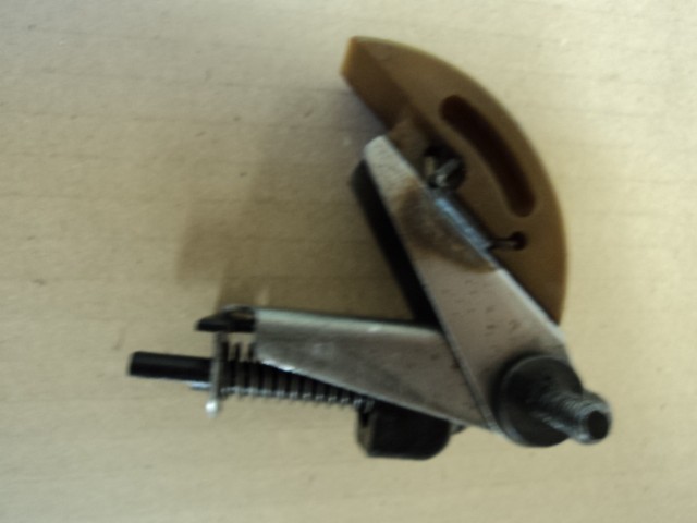 [169596] CHAIN TIGHTENER AND STOP PLATE (Used)