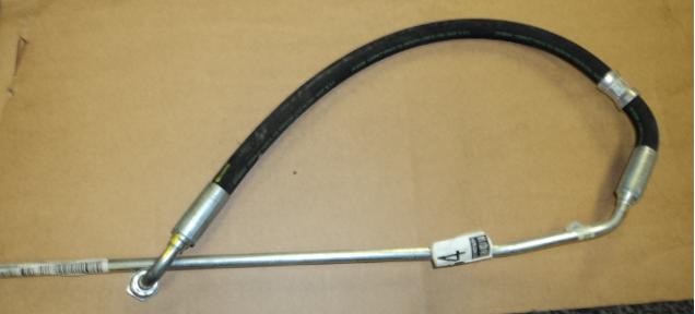 [204084] L.H. DELIVERY PIPE FROM UNION TO STEERING BOX  (Used)