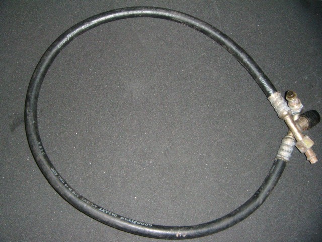 [64827600] PIPE FROM DEHYDRATOR FILTER TO HOSE (Used)