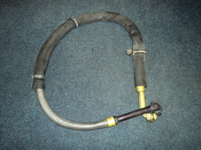 [141821] PIPE FROM RADIATOR TO TANK (Used)