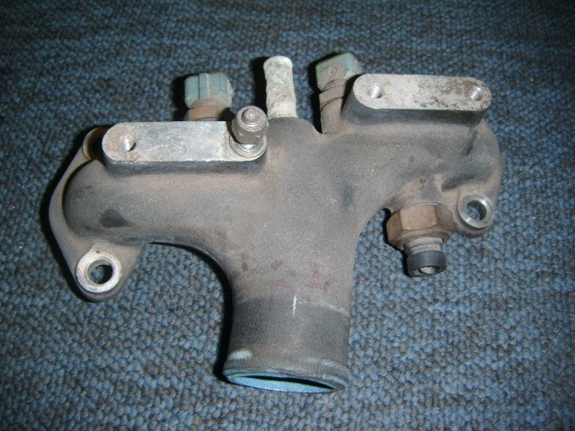 [144246] WATER OUTLET MANIFOLD CONNECTION DUCT (Used)